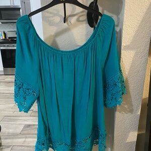 Beautiful Women’s teal XL top with crochet trim on sleeves and hem line